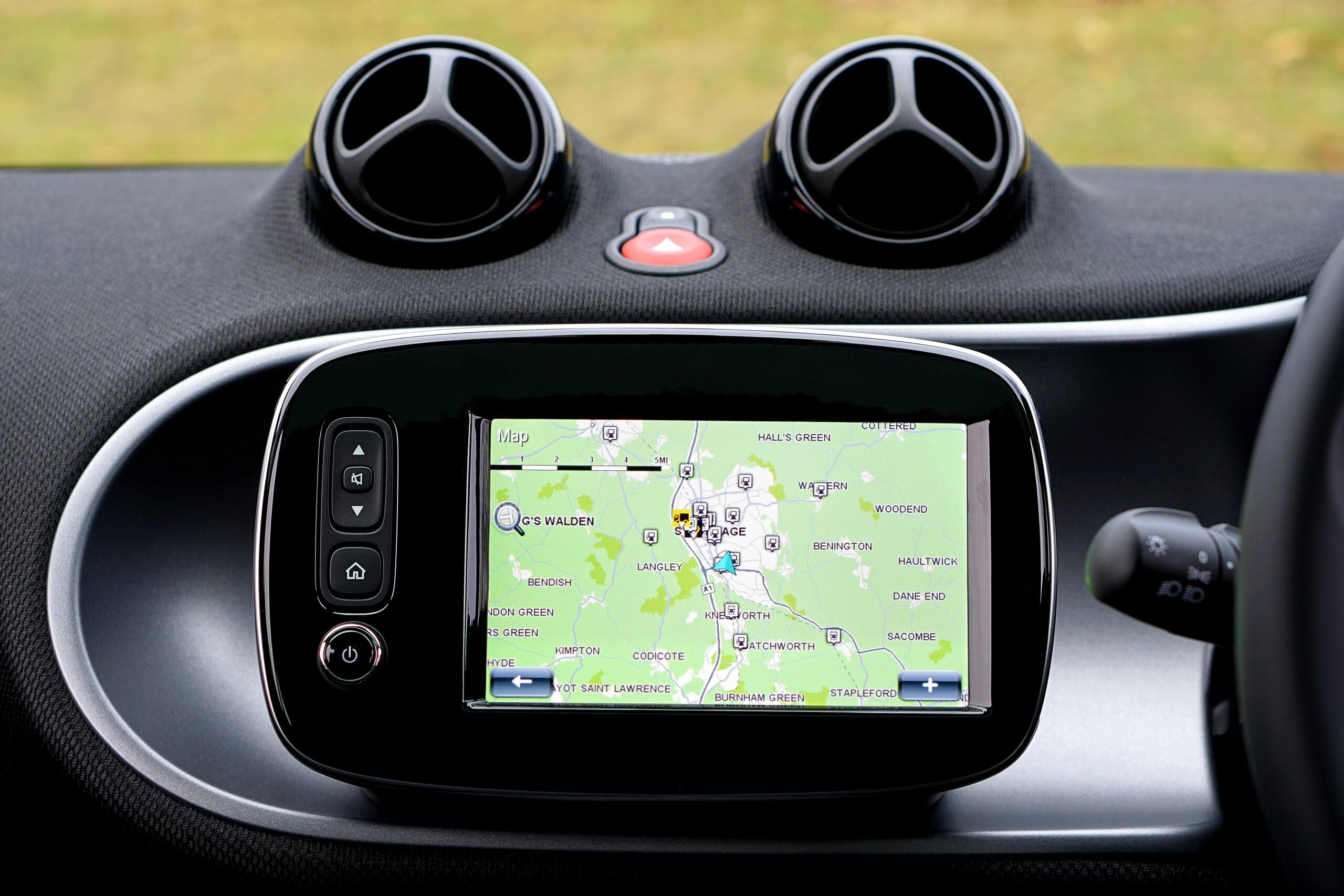Close-up view of a modern car dashboard featuring a GPS map for navigation.